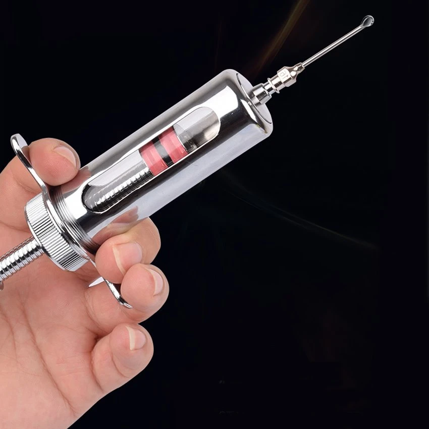 detail of Veterinary metal syringe